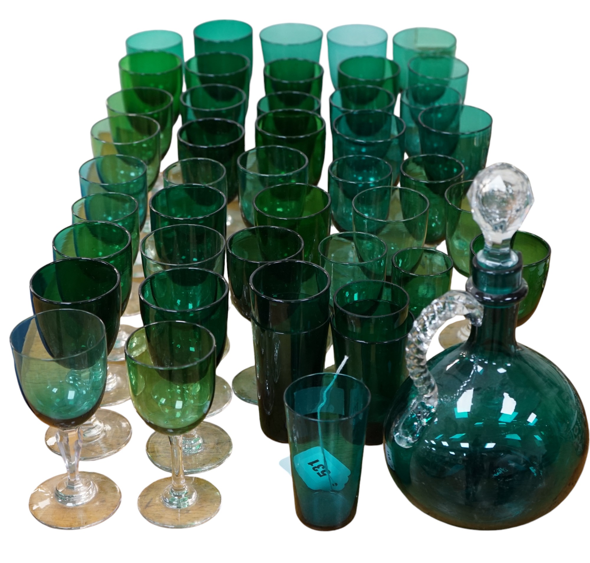 A collection of Victorian green glassware including a claret jug, 24cm. Condition - mostly good